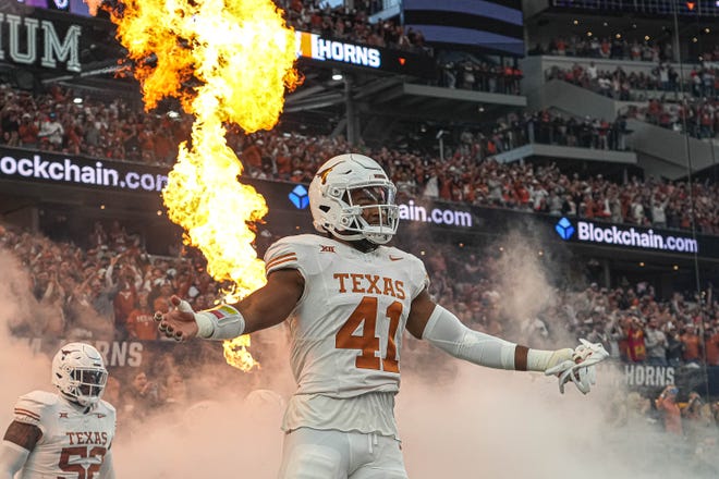 Texas Longhorns linebacker Jaylan Ford (41) takes the feild ahead of the Big 12 Championship game against the Oklahoma State Cowboys at AT&T stadium on Saturday, Dec. 2, 2023 in Arlington.